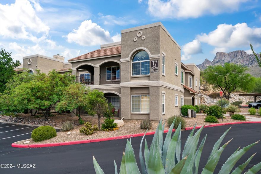 Stunning 3 Bed 2 Bath condo with a single-car GARAGE that has coated flooring at The Boulders at LaReserve, Oro Valley.  This beautiful second-floor condo offers execeptional mountain views and amazing sunsets.  The open floor plan features a great room with a refaced fireplace and custom mesquite mantle, crown molding throughout, and a gourmet kitchen with stainless steel appliances and a threee-tiered custom wood breakfast bar.  The master suite includes a California closet system with extended storage and a wall safe.  Additional highlights include a guest bedroom with a built-in desk, double pane windows.  Step outside to enjoy the wrap-around patio deck, complete with an electric fireplace for cozy evenings. Community heated pool, spa, and fitness center.  Prime locatio that is close to the state park, restaurants, medical facilities, and hiking trails with the bike loop across the road.  Experience luxury living. Schedule a showing today! 
Seller would like to work with Davis Allen-Graham for title work
(Pioneer Title Agency) 
6875 N Oracle Rd Suite 205
(520)797-2693
