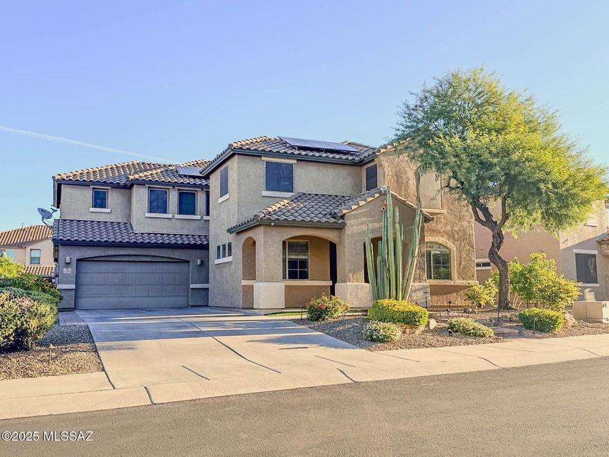 Gorgeously upgraded 6bd/4bth home on oversized lot with pool and owned solar system! The popular Badra floorplan with formal living room, great room, separate entertainment room off ofthe great room, loft, guest suite down stairs, and storage room off of garage. Gourmet kitchen features quartz counters, cherry wood cabinets, large island, and SS appliances. Travertine tile in all walkways and wet areas. Custom built in cabinetry in greatroom, storage room, and laundry room. Oversized rooms, beautiful bathrooms, and lots of living space. Resort style backyardoffers pool, turf, brick pavers, covered patio, and easy care landscaping. Large 3 Car Garage, covered porch, and patio! Two community parks, one within view of house, and gated community! Owner is licensed real estate broker in AZ.