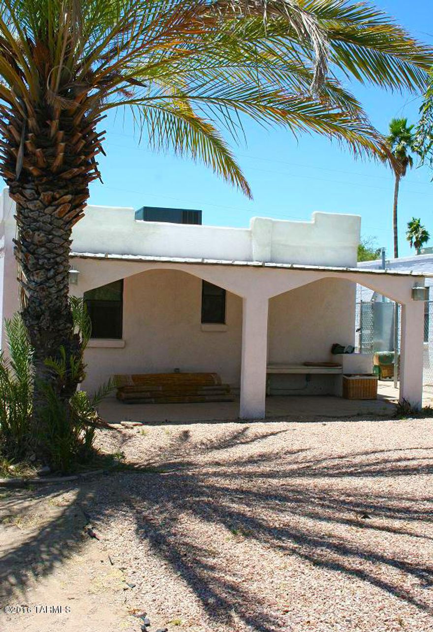 Centrally located bungalow! Convenient to U of A, UMC, Rillito Regional Park, and more. Fully fenced front and back yards, carport plus room for additional off-street parking, covered front porch and back patio, plus storage room. Updated with A/C, all appliances including washer & dryer, gas range, dishwasher. Must see to appreciate!