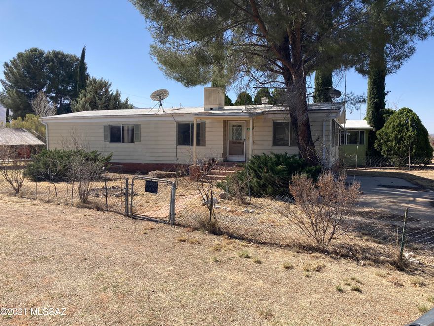 Fix up affixed mobile in Village of Dragoon - 2 bedroom, 2 bath, built in cabinets - nice corner lot - perfect first time buyer or rental