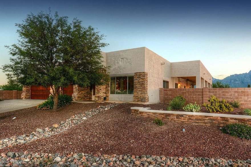 STUNNING SOFT CONTEMPORARY W/ BREATHTAKING MOUNTAIN VIEWS
ON OVER 1 ACRE IN THE DESIRABLE FOOTHILLS RIVER VIEW ESTATES.
LOVELY FOYER ENTRY,AN ELEGANT LIVING RM & DINING RM W/HIGH 
CEILINGS,LG PICTURE WINDOWS,GOURMET ISLAND KITCHEN W/ 
GRANITE COUNTERTOPS,STAINLESS STEEL APPLIANCES,REFRIGERATOR,WINE COOLER,BREAKFAST AREA OPEN TO FAMILY RM W/FIREPLACE,BEAUTIFUL TRAVERTINE TILE FLRS,3 BEDROOMS+STUDY W/BUILT IN BOOKCASES,DESK,AMOIRE,(4TH BEDROOM),MASTER SUITE W/SITTING AREA,LUX BATH W/TRAVERTINE COUNTERTOPS & 2 VESSEL SINKS,LG WALK-IN CLOSET, LAUNDRY ROOM & 3 CAR GARAGE.FABULOUS
SPRAWLING BKYD W/COV'D WRAP AROUND  PATIOS,POOL,SPA,OUTDOOR FIREPLACE, BARBECUE W/EATING AREA,RAMADA,FIREPIT
& AMAZING MT.VIEWS. FLR PLN LOCATED UNDER PHOTOS,VIRTUAL TOUR