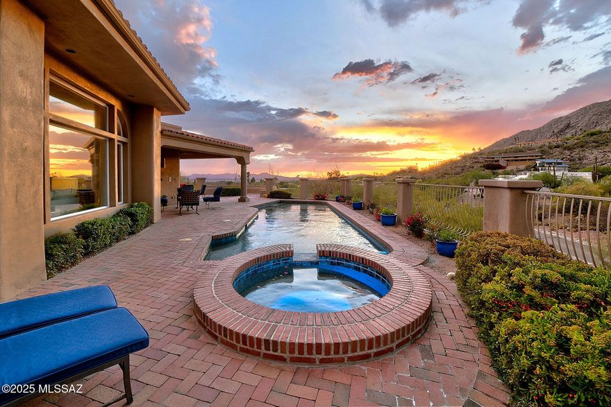 Exquisite Santa Barbara style home with majestic mountain views situated on over 1 acre in prestigious gated Skyline Country Club. Lovely front courtyard with fountain, foyer entry with marble tile floors , living room with dramatic high cathedral beam ceilings, elegant fireplace, large picture windows, formal dining room, wet bar, gourmet island kitchen with custom cabinets, stainless steel appliances, lovely breakfast area open to cozy family room with 2 way fireplace, walk in pantry,  beautiful wood floors, 3 bedrooms (split plan), each with their own baths, plus a powder room. Incredible primary suite with office/exercise area, fireplace, luxurious bath with marble countertops and marble floors,  double vanities, Jacuzzi tub, large shower, 2 walk-in closets, plantation shutter.... ....... a private patio with a charming fountain. Additional features include masonry stucco construction, large laundry room with washer, dryer and sink, 3 air conditioning units, 2 hot water heaters, new tile roof and 3 car garage with mini split ac system in addition to a very large storage room. Enjoy the fabulous backyard with covered brick patio, gas heated pool and spa, built-in BBQ, lush landscaping, long private driveway, Dist.16 schools and Magnificent mountain views!!!!!