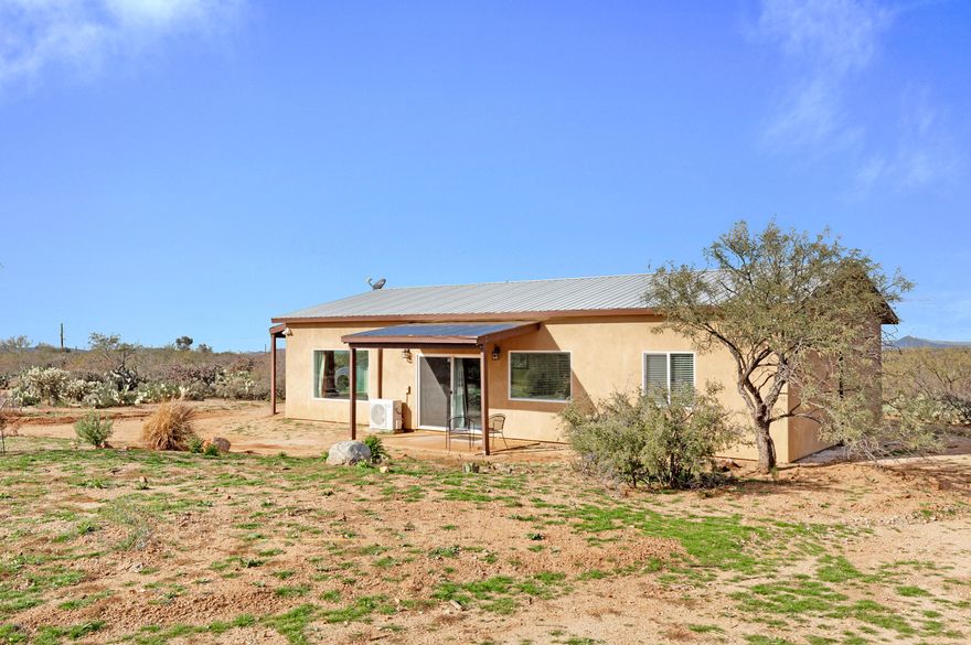 Looking for Horse property? Get away from it all with this 2018 stick built home sited on 2.5 acres.  Ten foot ceilings, granite countertops, upgraded easy close cabinets, all new stainless steel appliances, propane gas range, LED light fixtures, custom concrete stained floors, custom tile shower, energy efficient AC/Heat Pump, solid pine interior doors, propane gas BBQ hookup, dual pane low E vinyl clad windows, and the list goes on.