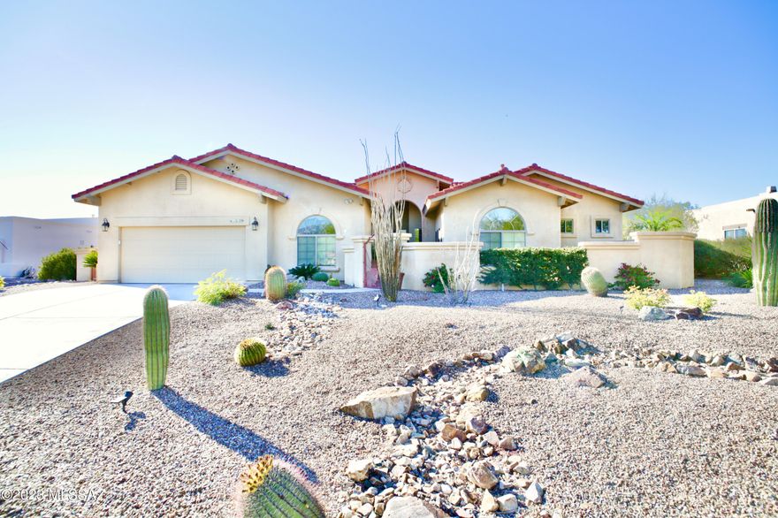 *** Please note this house is only available for stays 90 days or longer*** 
Discover this exquisite 5-bed, 2-bath home in Reflections Ridge, Oro Valley. With 11-ft ceilings, stunning millwork, and plantation shutters, it radiates elegance. The serene color palette sets a tranquil tone. Enjoy resort-like amenities, including a heated pool/spa with a soothing waterfall. Adjacent to it is a charming fire pit deck, perfect for relaxing evenings. This custom home embodies luxury and comfort, leaving no detail overlooked. Contact us for Rates Jan through April as they are higher.