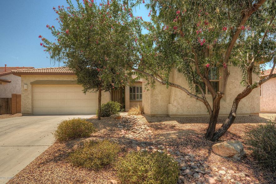 Must see this beautiful newly updated, ''model like'' home in the sought after subdivision of Gladden Farms. This 4 bedroom 3 bathroom home also includes a casita with a private entrance. Enter this large open floor plan through the grand foyer.  Gorgeous kitchen complete with granite counter tops, beautiful back splash & top of the line cabinetry. The large backyard is great for entertaining with a covered patio, pool, spa and built in bbq. Enjoy the community parks and walking trails along with easy access to I-10.