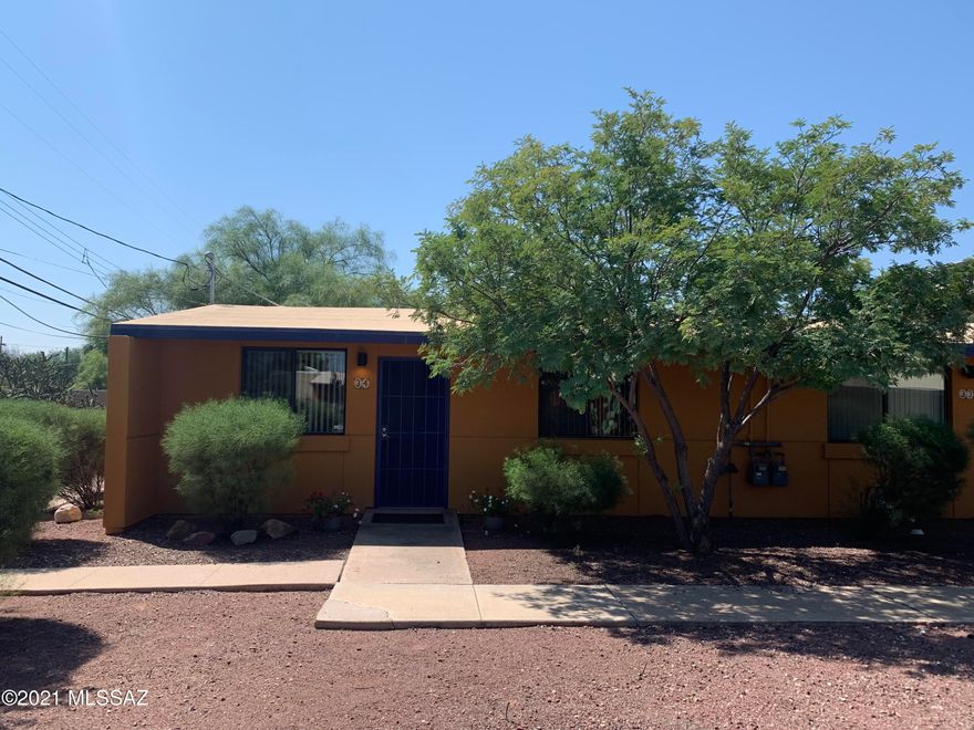 Premium single story bungalow one bedroom condo near downtown.  Corner unit with wood and tile floors, security door, finished back yard with pavers.  Gated Community with pool, spa, basketball court, Ramada, grills, and playgrounds.  Close to shopping, U of A, A Mountain, bus lines, hospital, and I-10.  Includes Washer and Dryer.