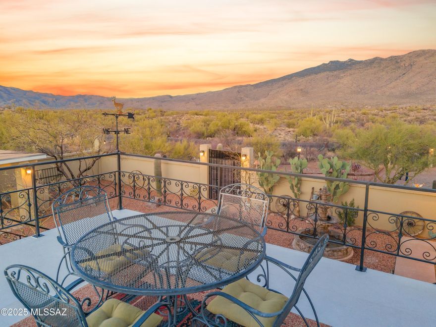 NO HOA. NO RESTRICTIONS. PURE FREEDOM.
 
Welcome to a desert sanctuary that combines freedom, elegance, and a lifestyle that can't be replicated. Nestled on 3.69 private acres at the base of the Rincon Mountains and bordering Saguaro National Park East, this property offers the rare promise of forever views. With both the Catalinas and Rincons surrounding you, your sweeping 360° vistas are guaranteed to remain pristine—nature here is your only neighbor.

From the moment you arrive, the charm is undeniable. An extended concrete driveway pad offers ample space for guests, toys, or trailers, while mature desert vegetation surrounds the property, creating a setting that feels secluded yet welcoming. Though conveniently located near a main road for easy access to shopping, dining, and city amenities, the home is perfectly situated in its own natural "bowl," giving you privacy, serenity, and minimal exposure to traffic. Truly the best of both worlds.

Step inside and you'll find a home designed to bring the outdoors in. Large dual-pane picture windows perfectly frame the mountains from the living room, dining area, and primary suite, while natural light fills each space throughout the day. Every detail has been thoughtfully updated: beautiful marble flooring, custom shutters on the west side of the home, and brand-new quartz countertops in both the kitchen and the primary bath. With dual HVAC systems under five years old, comfort is assured in every season.

The primary suite is your private retreat, a place to unwind while the beauty of the desert unfolds right outside your window. Outdoors sip your morning coffee on the expansive wrap-around porch, or climb the custom rooftop deck for fiery sunrises and breathtaking sunsets that never get old.

For those who need extra space, the detached workshop/garage is perfect for car enthusiasts, hobbyists, or anyone craving room for projects and storage. Combined with the property's horse zoning and freedom from HOA restrictions, this retreat offers versatility that few homes can match.

It's rare to find a property that offers this level of privacy, flexibility, and natural beauty, all while being priced below market. This is more than a homeit's a lifestyle, and it's waiting for you.