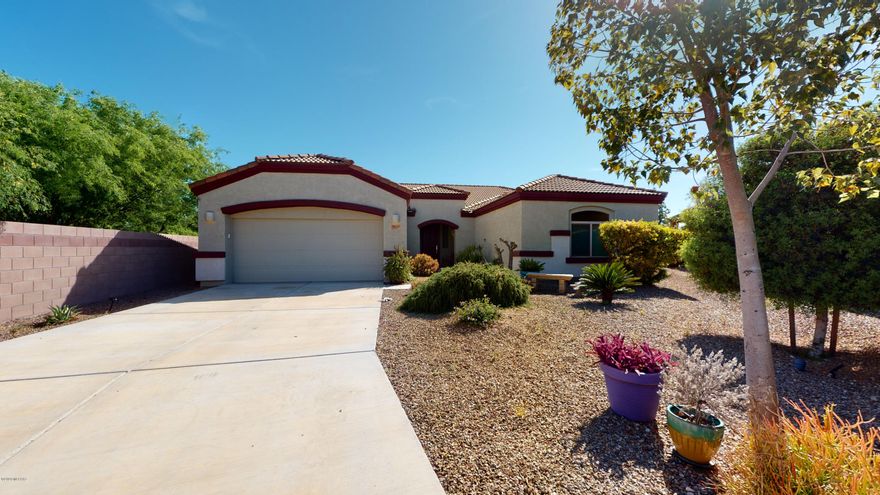 A Diamond in the rough. Picture Perfect home! Shows like a Model. Move-in Ready! ''pride of ownwership''  Inmaculate  one story 2264 SQFT home w/ 3 Beds/2 Full Baths/Plus Den, Walk in closet in every bedroom. Granite covered island w/breakfast bar & beautiful lighting, gas range & walk-in pantry. Huge back yard, with lot of citrus trees, oranges, limes, lemons grapefruits,  and a firepit! Enjoy relaxed outdoor living in the immaculate, easy-care backyard with no neighbors directly behind or to the side.. Perfect for alfresco dining & relaxation. 
4 minute drive shopping to  Tucson Premium Outlets.This is a low density community with no through streets and easy access to I-10. GREAT VALUE in Northwest Tucson.