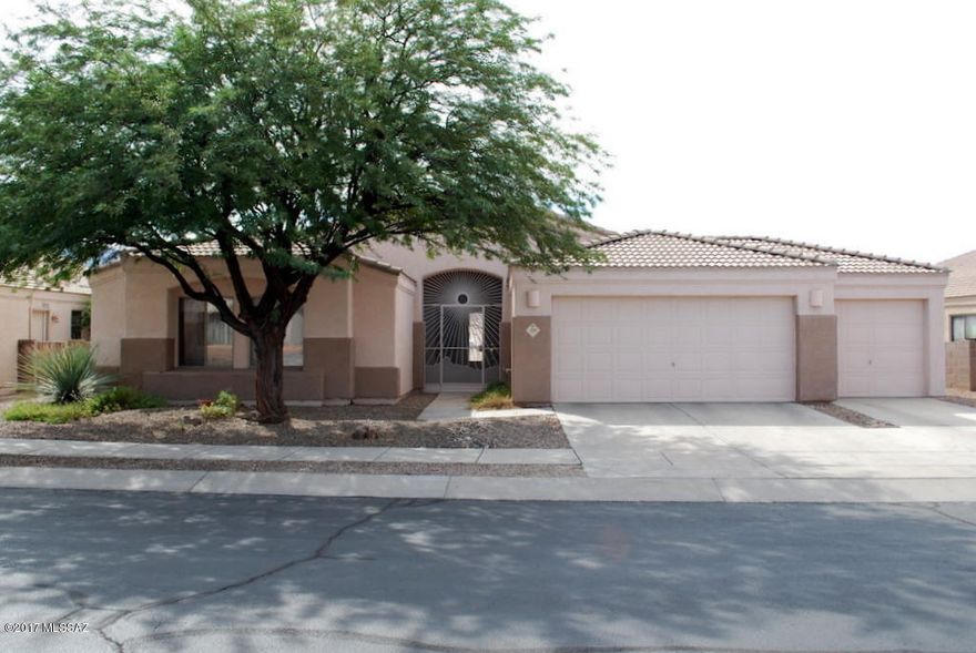 Oro Valley 4 Bedroom 2 Bath with 3 Car Garage in the desirable Monterra Ridge area. Gated front entry leads to large living area with vaulted ceilings and lots of natural light. Eat in kitchen with lots of counter and cabinet space as well as breakfast bar. Access to full length back patio from kitchen, living room and master suite. Large master suite and master bath has dual sink vanity, separate garden tub & shower and walk in closet. Good sized yard with easy care landscaping and great views of Pusch Ridge to the East. This home is offered as NON-SMOKING. Pets are subject to owner approval.