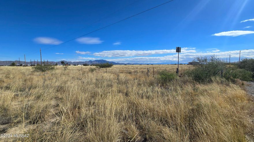 5.34 acres of Raw Land with mixed use. Zoned GB ( General Business) with Mixed Commercial use next door / behind and Residential homes in this same Zoning. Power is on the lot line.  Amazing Views of the nearby Mountain Ranges.  Close to town in the County, on State (ADOT) Maintained Road. Seller is open to reasonable offers.