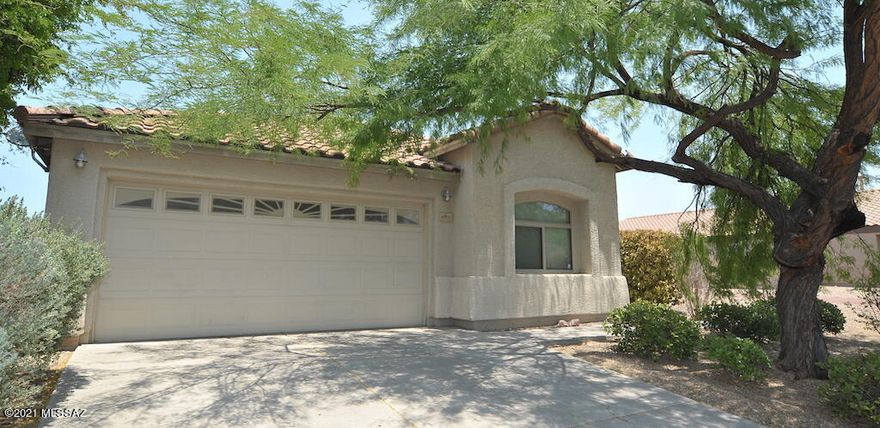 Great Room Concept 3 bedroom 2 bath with open floor plan in Desert Willow Estates. Across the street from community park and kids play area. Recently updated wood look tile floors and fresh paint. No carpet. Open kitchen with big breakfast bar/island, gas stove, walk-in pantry, maple cabs & stainless appliances. Big vaulted ceiling great room with picture window that is also pre-wired for surround sound. Primary suite has dual closets, one of which is a walk-in, dual sink vanity and a garden tub. Beautifully landscaped yard is perfect for entertaining and relaxing with gas fire pit, covered patio and hot tub. Vail School District.