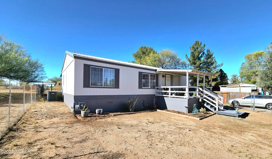 Come home to quiet, country living!  This 3 bed, 2 bath, 962 sq. ft. home has been freshly remodeled & is in move-in condition.  New aluminum roof in 2024.  Additional insulation added. All new paint inside & out. Fully remodeled kitchen w/ new sink, faucets & dishwasher. Updated countertops & cabinets.  Bathrooms fully remodeled w/new toilets,  cabinets & new sinks. Primary bathroom has new shower.  All new light fixtures throughout.  New wood laminate flooring & molding throughout.  New door knobs throughout.  Back porch w/extended roof added. Fenced in front & back yards.  Mature shade trees. On a paved road. Easy access to I-10 for commuting. This is a must see property!