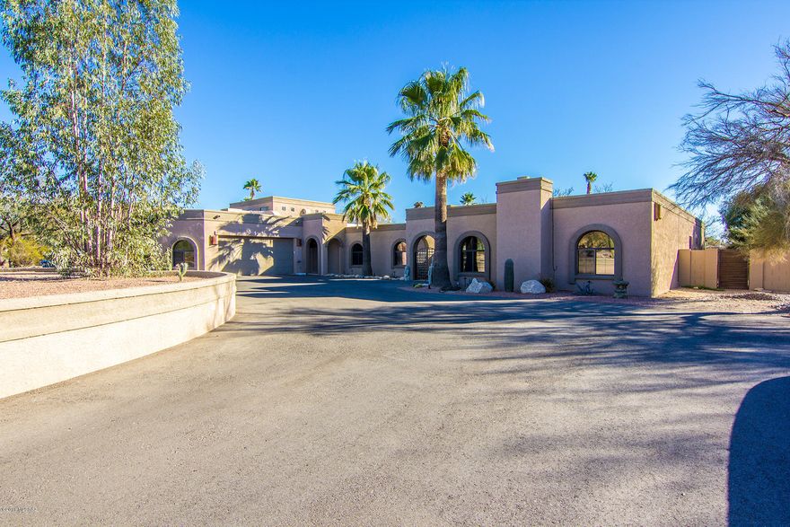 Experience this stunning home in an amazing location, minutes from shopping, recreation and more.  Recent high-end renovations include a luxurious kitchen, new bathrooms, fresh paint throughout, paved driveway, new landscaping, new HVAC in main zone, BRAND NEW windows and doors, and the list goes on!  Great home for entertaining with a formal livingroom, formal dining, two wet bars, game room, in-law suite roughed in for a full kitchen, loft bedroom/office, huge 5 car garage with RV Bay and shop, 3 Wood-Burning Fireplaces, Outdoor gas fire pit and whole house water filtration system.  All of the hard work has been done, move-in ready!  Listing agent is the owner of the property.