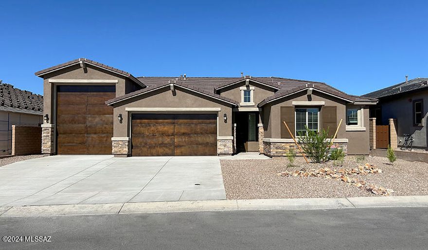 This ranch-style plan offers abundant living space and an attached RV/boat garage! Two bedrooms with walk-in 
closets are off the entryway, as well as a jack and jill bathroom and a powder room. This home also boasts two primary suites with walk-in closets and attached bathrooms - one with a deluxe walk-in shower. Adjacent is an expansive open layout showcasing a great room with access to the covered patio, a dining nook and a kitchen with a large pantry and a convenient center island. You'll also find a mudroom, laundry room and oversized UltraGarage!
