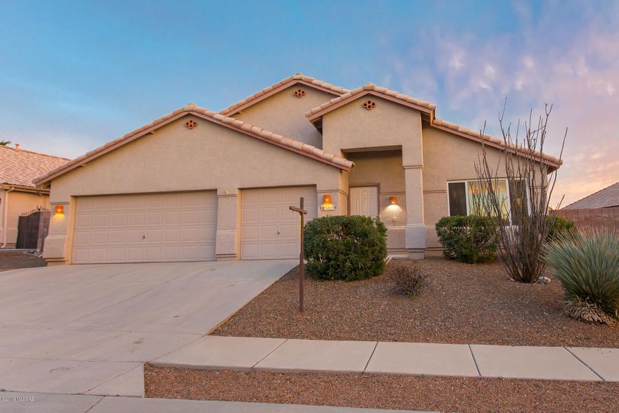 STUNNING & SPACIOUS, Gorgeous FOUR Bedroom, THREE CAR Garage Home, Premium Backyard Shady SE Facing Patio, Gas Grill Line, PEBBLE-TEC Pool & Spa, FIRE PIT, Ramada, Grassy Play Area. Gorgeous Extensive GRANITE COUNTERTOPS in Kitchen, STAINLESS STEEL Appliances, Gas Stove, Plenty of Cabinets & Long Granite Breakfast Bar Easily Seats 5 or 6. Spectacular Clerestory Windows in Family Room showcases the RESORT LIKE, Landscaped Backyard & Heated Pool, Dramatic Palm, Lemon & Grapefruit trees. Backs to Common Area, No House Directly Behind. Expansive Master Bedroom & Bathroom Suite has Large Walk In Closet w/Soaring Shelving. Dual Sinks, Granite Counter, Separate Shower. Tile Roof, Wood Laminate Flooring in Family Rm, Ceramic Tile, NO CARPET! Striped Curtains Do Not Stay, Do Not Touch Lamps.