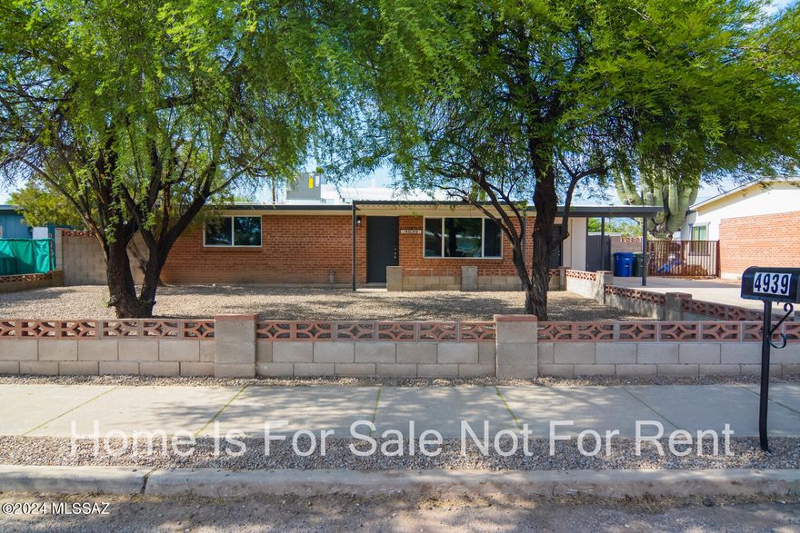 Seller will accept or counter offers from $294,500 - $304,500. Seller will offer up to 10k of seller concessions toward closing costs or interest rate buy down with approved offer. Beautifully remodeled Ranch style home. Located in a convenient East Tucson location. Charming brick construction. Rich wood look LVP flooring. Updated modern kitchen with stainless steel appliances and granite countertops. New custom interior and exterior paint. New carpet and padding in bedrooms. Brick fireplace in den. Updated modern bathrooms. Fenced back yard. Dual pane windows. Covered porch. Upgraded door hardware and light fixtures. No HOA. This home shows beautifully.