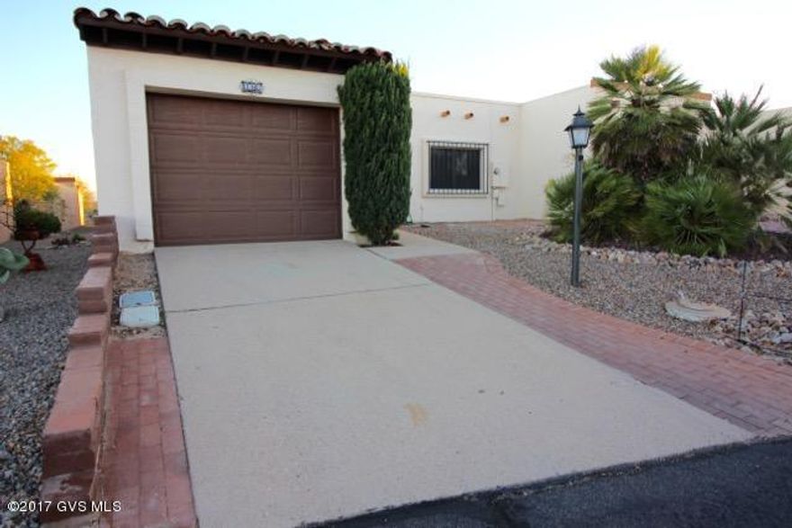 This home, located in desirable Desert Hills 2, is just the right size with 1330 SF and most the updates you are looking for. Inside you will find newly installed tile flooring, fresh paint, a newer hot water heater, a newer HVAC system, generously sized bedrooms with ample closet space and an Arizona Room with seamless entry from the Living/Dining Area. The Master also offers access to the Arizona Room, a walk-in closet and a step-in shower in the bath. The Kitchen boasts a breakfast nook, with adjacent Laundry closet, and a large pantry closet. The exterior has security screens on all windows offering peace of mind for the winter visitor, low care landscaping and a small mountain view from the back paver patio. This home is move in ready, furnishing will stay if desired.