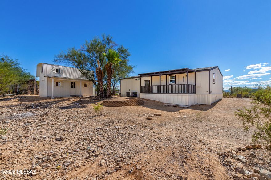 Beautifully REMODELLED 3-bed, 2-bath home on a spacious, private lot with mountain views. New AC system and plumbing throughout. Interior has been completely redone. Large great room, vaulted ceilings, new wood-look flooring in the high-traffic areas, new paint, and abundant natural light. The kitchen offers ample white cabinetry, built-in appliances, laminate counters, and an island w/butcher block counter.  All bedrooms feature new carpet. Large covered patio with beautiful mountain views!  2 level storage shed could be converted to a workshop. Your new home awaits. Owner/Agent.