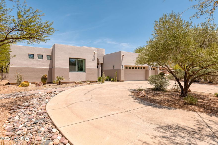 Welcome to your dream home in the heart of North East Tucson! This stunning gem of a home is a rare find, meticulously maintained and ready to steal your heart. Nestled in a peaceful, private cul-de-sac, this modern home offers serenity while being just minutes from Tucson's North East premier golf courses and local shopping. Step inside and feel the warmth of a home that's been lovingly cared for, complete with breathtaking, unobstructed views of the Catalina Mountains that will leave you in awe every day. With two brand-new AC units (installed in 2025) and an existing home warranty, you can move in with total peace of mind. The spacious 3-car garage provides ample room for vehicles, storage, or even a hobby space.