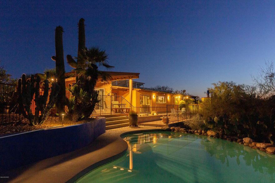 Amazingly well maintained  home in the heart of Foothills.  House sits on over an acre lot overlooking Catalina Mountains. Sparkling pool, built in fireplace and barbaque with plenty of entertaining space as well as many citrus trees gurantees you a relaxing and enjoyable leisure time in  your own backyard. A chef's dream kitchen with an extra large granite bar-island, plenty of counter space and a separate wet bar all overlooking the mountains. All 3 bathrooms have recently been remodelled and that master bathroom suite with huge his and hers walk in closets, walk in shower ... absolutely beautiful! House has an owned  solar system - no elactricity bill in half a year! Rare to find in Foothills - You want to make this your home!