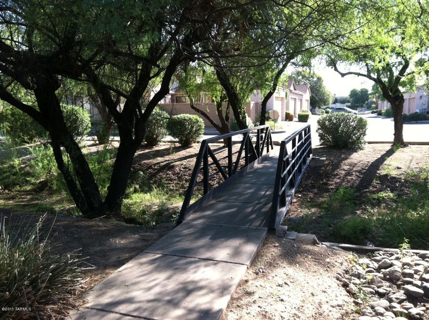 Wonderful patio home on corner lot & no common walls! Quiet gated community minutes from shopping, golf, U of A, Pima College Downtown and I10. Kitchen appliances include dishwasher, fridge and stove/oven. Washer/dryer connections. Both front and back patios with private courtyard entry! This is a must see!!