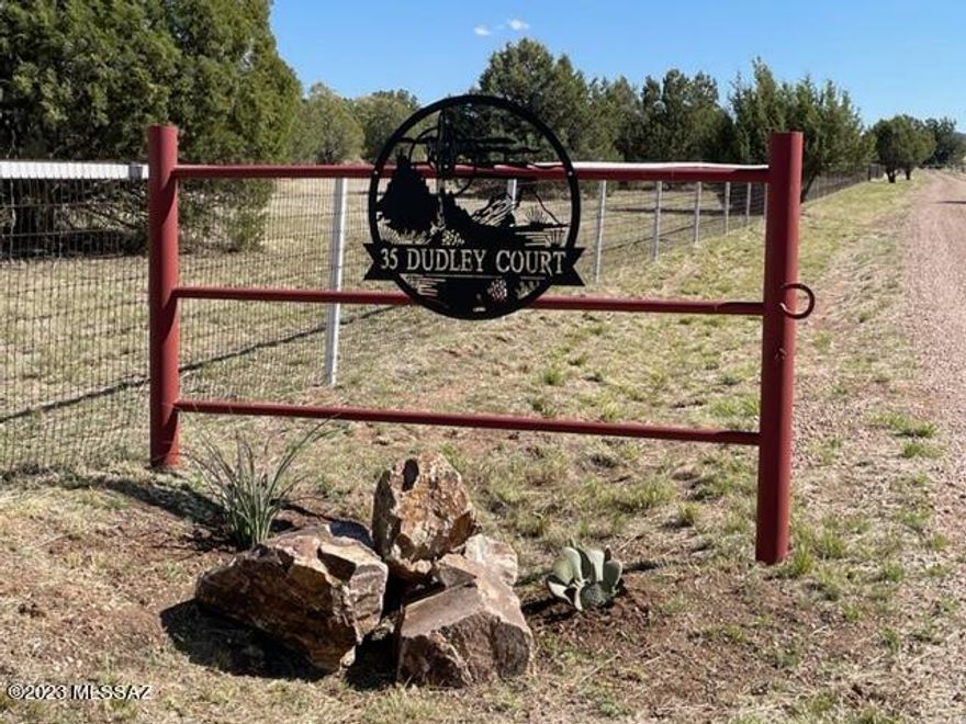 RARE FIND! Beautiful very private park like setting on 8+/- acres. 360 degree unobstructed views of numerous mountain ranges w/sunrises/sunsets. A very nice 2 BD 2 BA home nestled up to the National Forest w/direct access. All trees trimmed to Sonoita Fire dept for a buffer zone. Perimeter fenced w/no climb horse fencing. House being sold completely furnished. Kitchen has stainless steel appliances w/large oversized sink.  Dining area with sitting area around gas fireplace. Pantry w/freezer. Laundry with 1/2 bath, oversized sink, storage closet and utility area. Large Master with new 2 sink vanity w/granite counter tops. Guest BD w/large walk in shower & closet. Spacious LR w/fireplace. New  vinyl plank flooring thru-out.  48' x 48' x 10' metal drive thru bldg. 3 large horse stalls, 2 BD 1 BA guest house w/kitchen living room and two mini-splits. 2 car oversized garage. West Coast spa included. Truly one to see.