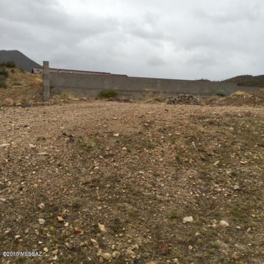 Attention builders and developers: Great opportunity to build 2 custom homes on ready to build lots. Paved streets with electric, gas, phone, sewer and water. Near Pima Community College, Star Pass and St. Mary's Hospital.