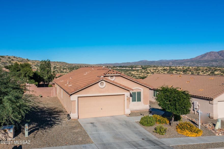 A very open 1540sqft are offered in this Pecos II 3/2 + home-office in Eagle Crest Ranch. The entry opens to a family-centric great room w/vaulted ceilings & an adjacent optional 4th bedroom which can be utilized as a functional home office, a family room extension, or a separate but nearby playroom for the kiddos. A sizable kitchen w/adjacent dining nook features a functional island, upgraded shaker-style cabinets, SS appliances & loads of natural light from plentiful windows. The split floor-plan maintains the master to the rear w/2 guest beds & hall bath smartly centered. A shady north-facing, fully finished rear yard is complete w/drip irrigation & mature landscaping. A cul-de-sac location provides a quiet reprieve from traffic & the elevated lot provides for quite breathtaking views.