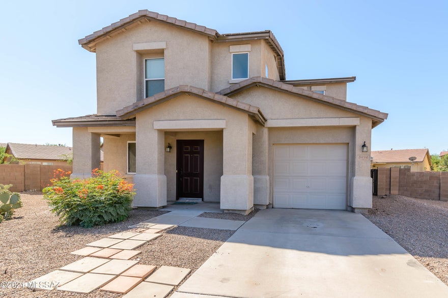 Great home Great Location. Huge back yard with covered patio. Open floor plan and ceiling fans throughout, Close to the Rilito River Walk. Easy drive to the U of A and Banner Medical Center. Don't wait on this move in ready home!