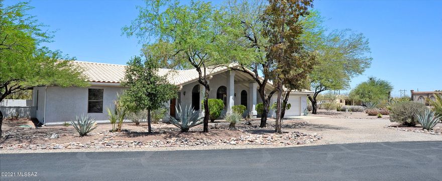 Semi-custom C & C Construction home in a quiet area of larger lots on the border of Saguaro National Park West. Enjoy this well maintained and tastefully updated home. It is close to many poplar stores, restaurants, hiking and other attractions.Photos can only provide a visual of the property this home requires a personal visit to let you feel its warmth and charm. It has a sought-after open floor plan which offers lots of ''thinking out of the box'' decorating possibilities. It has a wonderful yard for entertaining and family gatherings..... You deserve to come and see this property... You will not be sorry you did....