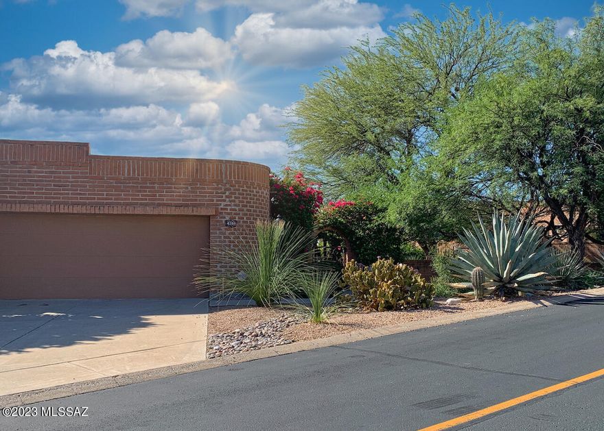 Impressive Ridge-top Contemporary with Views & Updated Gourmet Kitchen & Baths. This 2BR + Den home boasts updated Bathrooms and designer Cooks Kitchen with six burner Wolf Gas Range, Dacor Microwave/Convection oven, Meile Dishwasher, Full island with prep sink w/disposal as well as deep farmers sink w/garbage disposal. Fireplace & Gallery lighting in Great Room. Engineered mahogany floors in all Living areas & BR's. Tile in Kitchen & Baths. Floor to ceiling sliding doors drink in Mountain views & City lights. Enjoy the curated cactus plantings or relax in the shade of one of the largest side yards in Fairfield. Spacious Miramar model has 2 Bedroom plus a Den that was a 3rd Bedroom. New HVAC July 2023. Minisplit HVAC in garage with lights for workshop-crafts.