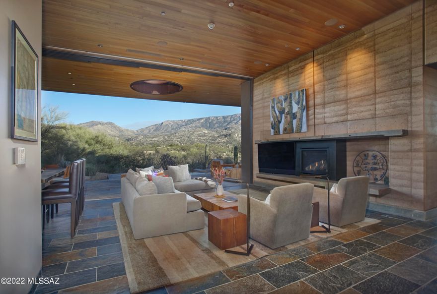 Welcome to your private wellness sanctuary, tucked away in a small enclave of homes on the grounds of MIRAVAL Resort in Tucson, AZ.  This residence and this lifestyle are distinctly different.  Here, you hit the pause button and recharge.  With the amenities of a world class destination spa at your doorstep, it's easy to do. Created by the forward-thinking minds at MITHUN of Seattle, this home intentionally feels subdued from the approach, while offering a powerful experience upon entering.  Blending with the earth and honoring the desert were top of mind for a sustainable build.  Awarded Silver LEED status from the Green Building Council, the property integrates materials, textures and colors that speak to the surrounding landscape. Seamlessly blending indoors and out, with unobstructed views of the Catalina Mountains, this setting invites you to relax, breathe and connect with nature.  Layers of the desert unveil themselves as light moves throughout the day.  This is truly a place that allows the mind to clear and opens space for creative thoughts.

A thoughtful layout offers the ability to comfortably host guests or delineate spaces for different functions.  The 2400 sq ft main house includes the primary suite, guest bedroom, guest bath and great room flowing to an expansive patio from which you feel completely secluded.  With a gas fire pit, infinity plunge pool with swim jets and outdoor daybed, this area adds substantial living space to the home.  A 700 sq ft detached casita provides a private setting for guests with separate living and rest spaces, ensuite bath and courtyard with a jetted spa.

Homeowners and their guests may choose to immerse themselves in the experiences at MIRAVAL as little or as much as they desire.  The resort has created an environment in which a wellness journey is completely individual and offers a robust variety of facilities, services, and activities.  A sampling of offerings includes spa treatments, fitness classes, yoga, meditation, hiking, mountain biking, equine therapy and horseback riding, lectures, culinary classes, and spiritual sessions.  With on-site dining, concierge and transportation services, everything needed is at your fingertips.

A unique and easy to own asset, this property would work beautifully as a vacation home, seasonal residence, or corporate retreat.  There is the option to rent the property through the resort-managed rental program when unoccupied, if desired.