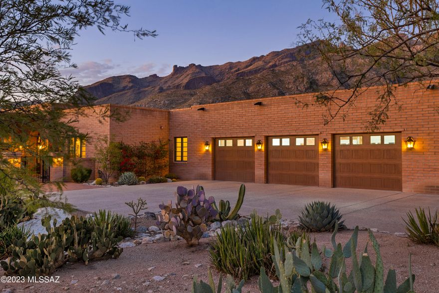 Spectacular, immaculate, masonry 3,486 SF,  4 bdrm/3bath custom home with 6 car garage, dramatic city and mountain views...located in a quiet foothills community. Large pool adjacent to covered patio with fireplace, gas grill and sink.Plus a private spa patio just steps from the 14'X32'  primary bedroom with fireplace and sitting area with  large walk-in closet. Kitchen features large window overlooking Finger Rock and broad Catalina Mountains.A cook's delight  center island, + 2 Viking microwaves + Viking 6 burner gas range with grill and 2 viking ovens ..1 smaller and 1 full size. Generous guest parking front and back.Built by John Kline in 2010. (SELLER PREFERS CLAIRE MORGAN, STEWART TITLE, (2955 N. Swan Rd., 85712) PRELIMINARY TITLE COMPLETED and attached to listing documents.