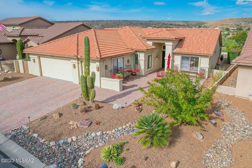 Beautiful golf course & mountain views from this popular extended Laredo. Completely updated 2bd/2ba + den home (1,912 SqFt). Perfect setting as great room opens to the fabulous kitchen w/ granite counters, new cabinetry w/ pull out shelves, stainless appliances, subway tile backsplash & island. Home offers a split bedroom plan w/ separate full bath for guests. Master Suite hosts an adjoining bath w/ dual vanity, large walk-in shower & ample closet. Extras include tile flooring throughout, plantation shutters, HVAC 2019, paved driveway, golf cart garage & ceiling fans in all rooms. Professionally landscaped backyard with fruit trees, rolling shutters & golf course views. SaddleBrooke is Tucson's Premier Active Adult Community w/ Fitness Center, Pool, Golf, Tennis & Performing Arts Center.