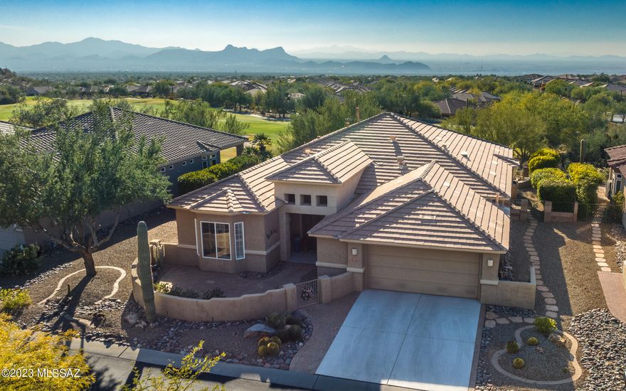 Highly sought out SANTA BARBARA ideally located on the Golf Course w/Mountain Views. VIEWS of the 14th Green and Sunsets. 2542 Sq Ft; 3BR/2BA + DEN. Formal Dining Room. Spacious Family Room w/Gas Fireplace & Media Built-Ins w/Surround Sound. Entertainer's Kitchen w/Corian Counter Tops; Tile Back Splash, Extended Wood Cabinetry and All Appliances Included. Spacious Owner's Suite w/Bay Window, French Door Walk-Out, Walk-In Closet and BATH w/Double Vanities, Jacuzzi Tub & Shower. Large Laundry Room. 2 Guest Bedrooms & Guest Bath. Front Room currently being used as DEN/Office. Large Covered Patio w/Built-In Grill, View Fencing with Desert Buffer. Front Courtyard. 2 Car Garage w/GOLF CART PUSH-OUT & Storage.