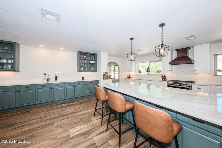 Close to Sabino Canyon & NEW KITCHEN UPDATE!  Stunning LIght & Open plan with Ample Taj Mahal quartz counters, Pantry, Tabasco Cask Wood plank look Tile flooring in front of home, Pella windows, Enjoy Refreshing pool and Sunset and Mountain Views! 2 AC units are both TRANE and one installed in 2022. Large Walled yard with refreshing pool, room for trampoline, playset camper, trailers,etc. Dist 16 Schools,  Must see!