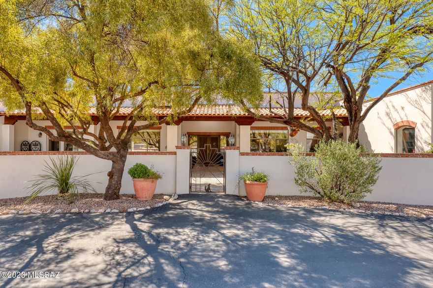 Home is range priced, Seller will accept or counter offers from $1,475,000 to $1,550,000.

Introducing a stunning and exclusive luxury residence nestled on over 3 ½ acres in the La Cebadilla community, offering breathtaking views of the Catalina and Rincon mountains. This masonry built home offers unparalleled craftsmanship and attention to detail with exceptional home features and exquisite natural exposed beams throughout, seamlessly blending with the surrounding natural beauty. 

The front yard boasts a covered patio with a tranquil water fountain, lush trees, and vibrant, colorful flowers, while the backyard offers a large covered patio with a seating area and TV, built-in BBQ, a sprawling lap pool, and a charming gazebo. Upon entering the grand foyer through large wooden French doors, you are greeted with an inviting ambiance that emanates throughout the entire home.

The kitchen is a chef's delight, boasting a large island with seating area, and top-of-the-line appliances to include a Bertazzoni gas cooking range.

The interior showcases a fireplace and exposed beams, creating a warm and inviting atmosphere. The master suite offers a serene retreat with a luxurious spa featuring a stand-alone soaking bathtub, double vanities, and abundant natural lighting with views of the Rincon mountain range. 

This magnificent estate also features a spacious laundry room with ample storage, a full-sized workshop, a fitness room, 3-car garage, and much more. With its stunning architecture, impeccable finishes, and extraordinary attention to detail, this luxurious home is truly an oasis of tranquility and indulgence on Tucson's East Side.