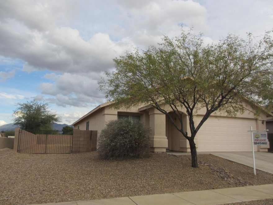 Cozy 3 bedroom 2 bath family home with a 2 car garage and a yard! This home has a formal living room and dining room as well as a separate family room. A/C, newer carpet, laundry room and a fireplace make this home comfortable and easy on the eyes. Pets are negotiable.