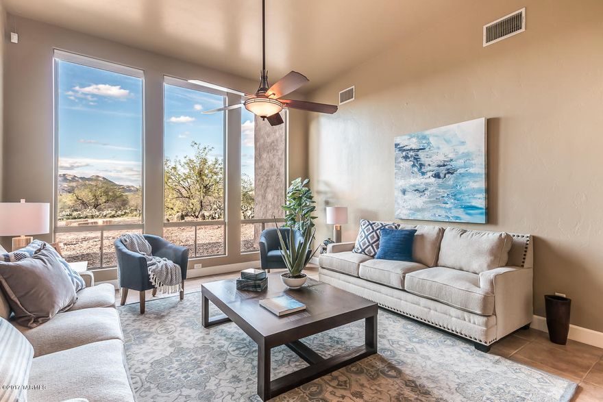 Custom built beauty on over 4 acres with amazing views of the Catalinas and Tortolitas! Gourmet kitchen & island, gas cooktop, maple cabinets, new Bosch dishwasher, new refrigerator, and plenty of seating at the bar to watch you entertain! Private backyard with covered patio and mountain backdrops. View it all from the north-facing Breakfast nook, Living Room, or Family Room, complete with a gas fireplace. Master Suite has a huge walk-in closet, shower, and spa-like tub. Walk-in closets in other 3 bedrooms, two of which include en-suite baths with granite countertops to match master and kitchen. Options are endless with your land because this house has no HOA, a shared well, and private road!
New exterior paint, Google Smart thermostats, surround sound system, garage shelving, drip system 4 1/4 in. baseboards, window treatments, and upgraded USB-friendly outlets in common areas.  Move in ready, this house is a gem!