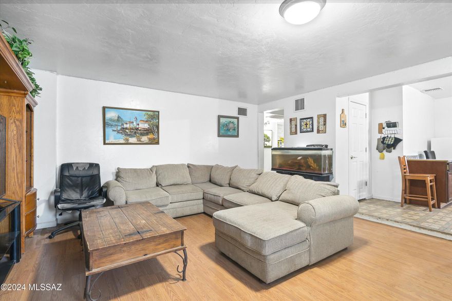 Looking for your next investment opportunity or a home to make your own? This property is packed with potential and ready for your personal touch! Featuring an open living room-to-kitchen concept, it offers a functional layout perfect for entertaining or everyday living.



A versatile bedroom with an attached laundry room is ideal for use as a home office, gym, or cozy den. The spacious front yard provides endless possibilities for outdoor enjoyment, gardening, or curb appeal enhancement. Plenty of room for your toys, boat or RV!

This home makes a fantastic opportunity for investors or anyone eager to customize their dream space. With a little TLC, this property can shine.



Don't miss this chance to create something special—schedule your showin