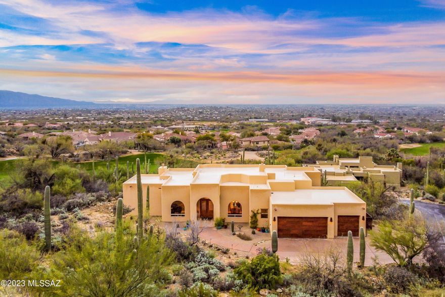 This is your opportunity to own in the exclusive gated Sabino Estates. Situated in the back of Sabino Springs Community and overlooking Arizona National Golf Course.  Check out the stunning view of the city while being nestled right into the beautiful mountains. This home shouts luxurious living and has been well maintained. The home features a split floorplan with 4 bedrooms and 2.5 baths. Don't forgot about the den that sits at the front of the home where you can enjoy the mountain views. Granite countertops from the kitchen to the bathrooms, tile throughout the home has a cohesive feel. Step out into the backyard with brand new turf, hot tub and automatic roll down screens to enjoy the amazing Arizona weather. The home has many small yet amazing features like the automatic TV that can hide away into the cabinet when its not being used. Feel cozy with the attached humidty control to the HVAC system and the circulating pump attached to the water heater to enjoy faster hot water! Come see this luxurious home today!
