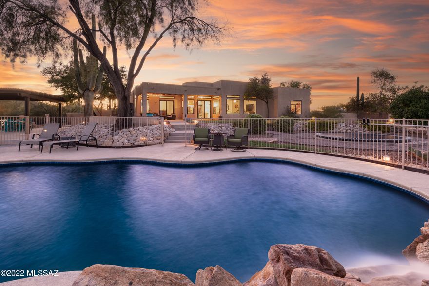 The term Staycation will take on a new meaning when you wake up every morning in your very own retreat. The east-facing resort style backyard is complete with heated pool, ramada, sports court, lush fruit trees, an in-ground trampoline, and spectacular mountain views. Situated on 4 saguaro-studded acres, this split-floorplan, open-concept 4 bed/ 3 bath home offers privacy and serenity, while still providing quick access to I-10 and Marana Marketplace. The large double stacked windows frame the mountain views and provide ample natural light throughout the home. Enjoy an abundance of storage from the three-car garage, large shed/workshop, and RV-sized carport. Too many recent upgrades to list, including stainless steel appliances, upgraded pool pump and heater, updated washer and dryer, interior paint, roof recoat, and additional electrical outlets in the garage, including a 220V receptacle. The gas line was extended to the south side of the home to offer the option to add a firepit or bbq. The entire lot has been surveyed and staked. Are you ready for a permanent escape from the real world?
