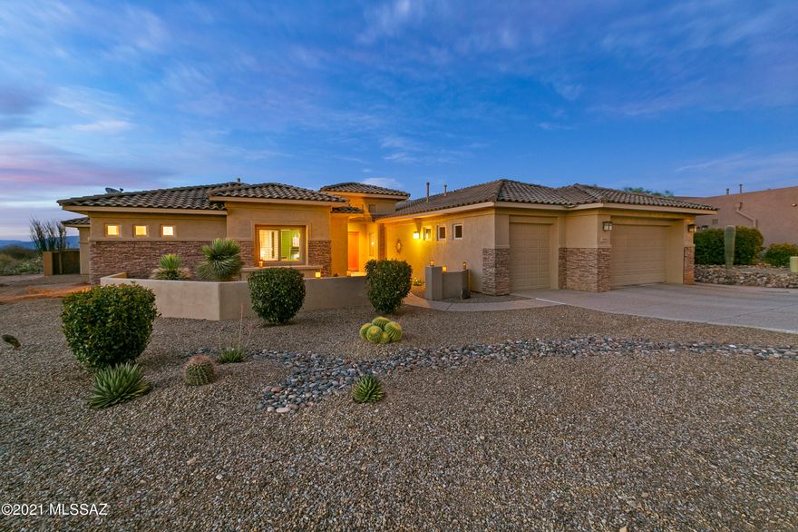 Outstanding Custom home in coveted Sycamore Canyon gated community hosts 180 degree unobstructed views of open Preserves Common area, lush vegetation and mountain views. Every detail of this multi-generational home and outdoor area have been meticulously designed and executed. From the open chefs kitchen to the outdoor BBQ kitchen to the tranquility of the living/dining area and master bedroom wing this home is one to just enjoy. 5 bedrooms and 4 baths plus an exercise room and a den support the amenities of the backyard outdoor living spaces: sunken kitchen, pool, spa with stone waterfall, fireplace, firepit, views that never seam to end. Enjoy your evenings and weekends with family and friends in this home designed for easy entertaining and luxury living.