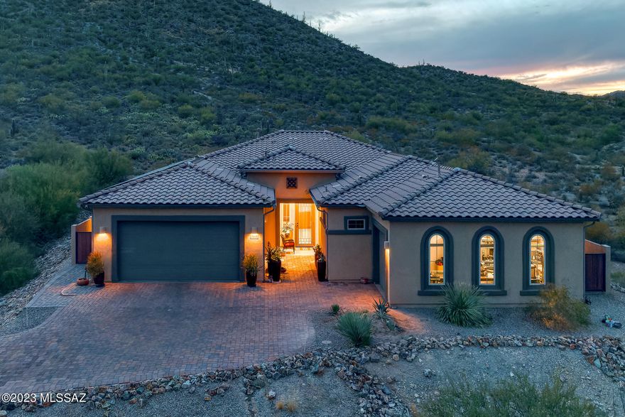 Stunning desert west property is a true oasis, situated on over an acre of lush, private desert landscape. The property boasts a generous living space of over 3100 square feet, providing ample room for both comfort and luxury. With Five bedrooms and four bathrooms, the residence is designed to accommodate a spacious and vibrant lifestyle.

One of the remarkable features of this listing is the inclusion of a next-gen guest house, offering a perfect blend of privacy and convenience for guests or additional family members. This addition enhances the versatility of the property, making it suitable for various living arrangements.

The architectural charm extends to the rooftop, where a deck awaits with a captivating spiral staircase, providing breathtaking panoramic views of the desert.