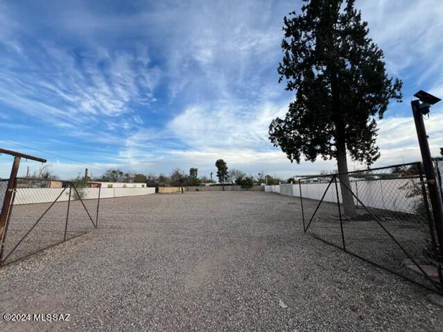 Vacant Land fully Fenced. 
Zoned Multi use Property,
Electric, Water And Sewer on Property. 

The Adjoining proper
 1337 W El Caminito Pl.