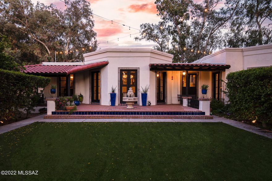 Gated compound within Tucson Country Club. A French country garden, waterfall pool and spa, beautiful antique doors and gates, 2
outdoor kitchens, an outdoor wood-burning fireplace, an interior courtyard and mature fruit trees.