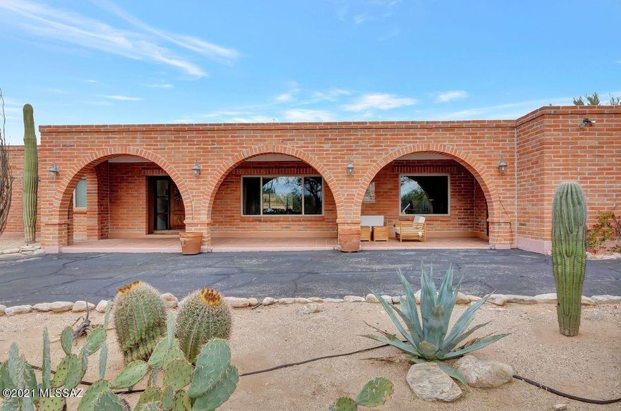 This Burnt Adobe home is tucked in the heart of the Foothills with spectacular Catalina mountain views
& convenient to La Encantada Mall. With beamed ceilings, 4 fireplaces(3 inside 1outside), remodeled
custom concrete flooring, new crown molding & extended height baseboards, newly interior paint, new
interior doors throughout, newer ceiling fans, newer light & facet fixtures, updated bathroom
cabinets, counter tops & lighting. Offers two bedroom suites, newer water heaters, newer lennox heat
pump, newer roof, California closet storage units in garage, new outdoor entertainment area with
outdoor kitchen, stackstone fireplace with TV mount on the FP, under the well designed pergola. Lush
& private back yard with citrus trees & easy care tuff with pool & safety net pool cover,