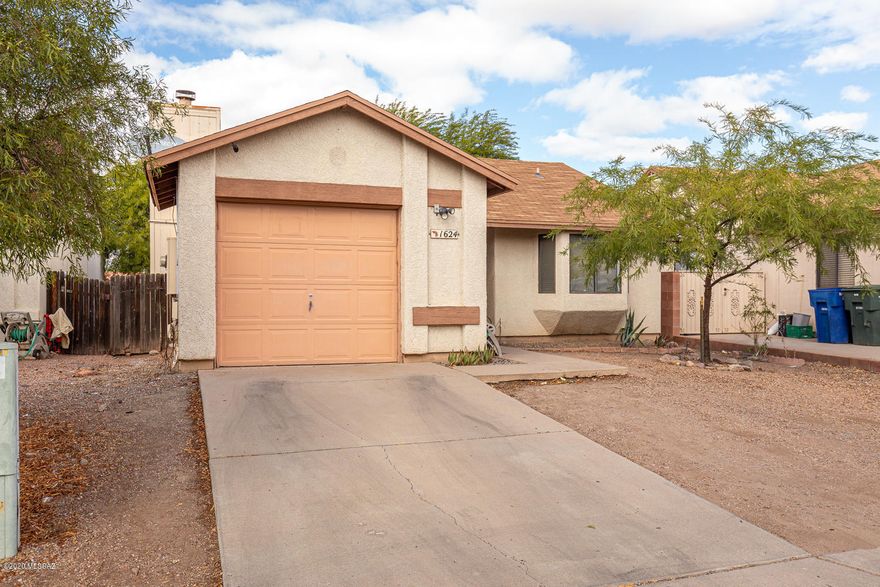 Seller shall counter or accept offers from $160,000-$170,000. Beautiful home located close to many amenities and with many upgrades. This home offers 2 bedrooms, 1 bathroom and an office/den area. Upon entering the home you will walk into a beautifully remodeled kitchen with granite countertops, stainless steel appliances and a farm sink. This home has also been updated with beautiful ceramic tile all throughout. Plenty of backyard space  to make it your very own oasis and a 1-car garage. Newer AC and water heater was replaced within the last year.