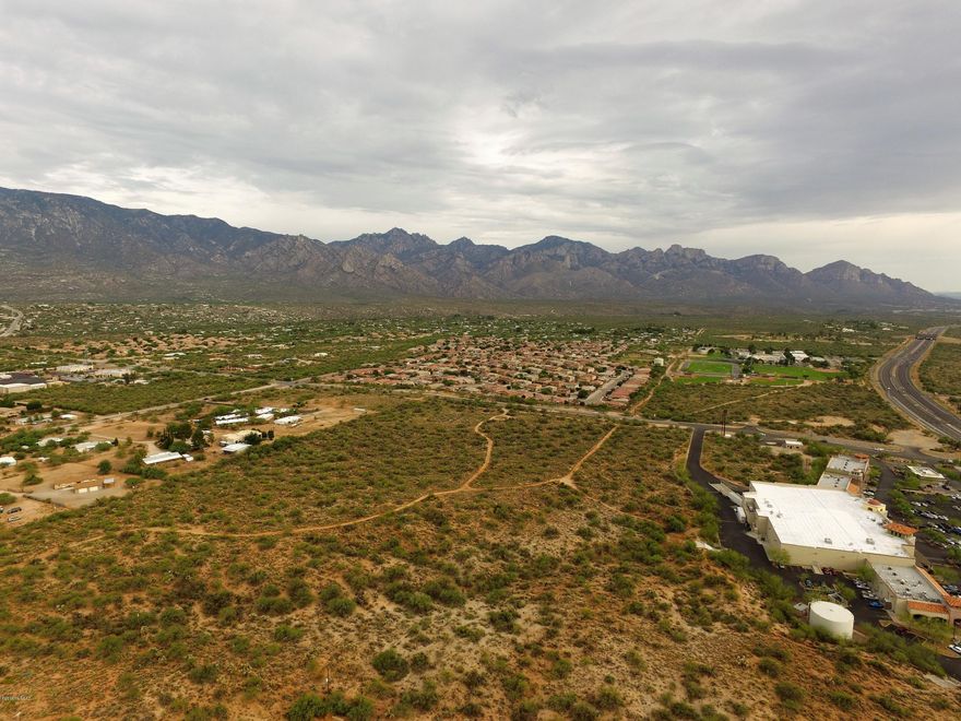 Beautiful property that offers lush vegetation and Stunning views of those majestic Catalina mountains, just waiting for the right future development. CR-4 Conditional zoned parcel, Fast growing area, just east of Bashas Shopping Center on Golder Ranch Dr, schools nearby, also available,  4 Adjacent lots  Parcel  PN #222-22-017B 7.5 acres, PN #222-22-015B 2.5 acres, PN #222-22-015A 2.6 acres, PN #222-22-0240 (2 of 3 acres) All listed in MLS