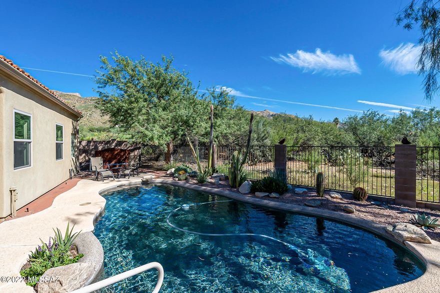 Immaculate 3 bedroom 2 bath Northeast side home .  Enjoy ultimate privacy in your heated PebbleTec pool with unobstructed mountain views. Master Suite boasts generous walk in shower and plenty of closet space.  All this with patio access.  You'll enjoy cooking in this kitchen with newly painted cabinetry and upgraded stainless steel appliances.  Easy flow for entertaining between the living room and family room leading to a beautiful outdoor space.  A prelisting roof inspection was completed 10/2022 with no issues found.  Located in Sabino Springs Community, which includes AZ National Golf Course (Robert Trent Jr designed) and flows into the Coronado National Forest.  Enjoy a quiet, yet vibrant, recreational community in a natural setting among Saguaros.